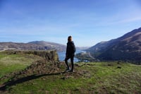 Woman looking into Columbia Gorge marissa-eric-l40zpAHouEY-unsplash