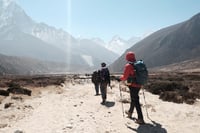 Hiking group surrounded by mountains